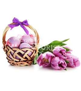 Easter Greetings. A basket of Easter eggs and a bouquet of fresh tulips will make a perfect Easter Greeting.
